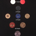 tantuszok és vizsgáló érmék